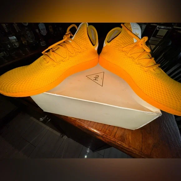 Adidas Pharrell williams Hu “solid gold” tennis shoes size 9.5(Like NEW)